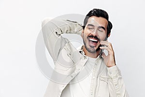 Closeup portrait man talking on the phone smile with teeth happiness and laughter on white isolated background, fashion