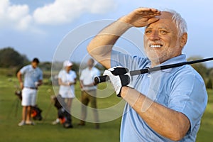 Closeup portrait of mature male golfer