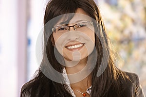 Closeup portrait of mid-adult woman smiling