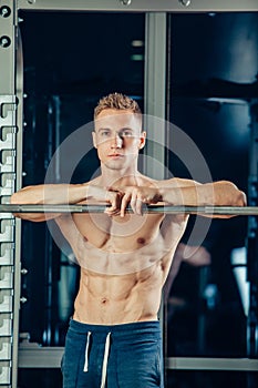 Closeup portrait of a muscular man workout with