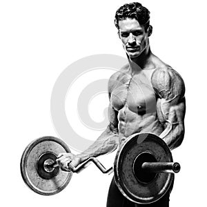 Closeup portrait of a muscular man workout with barbell at gym.