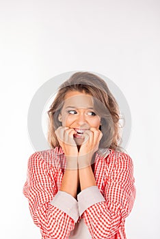Closeup portrait nervous looking woman biting her fingernails
