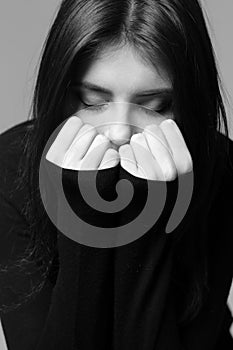 Closeup portrait of a nervous woman