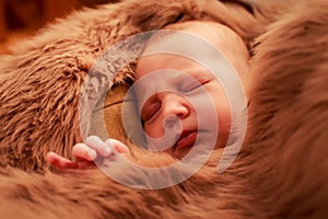 closeup portrait of newborn baby sleeping face