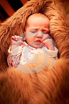 closeup portrait of newborn baby smiling face