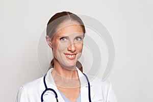 Closeup portrait of optimistic medical woman doctor or nurse