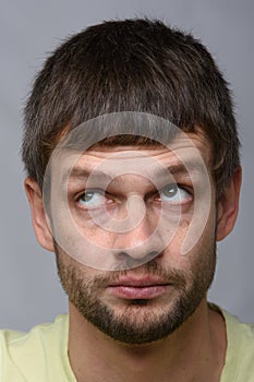 Closeup portrait of a pensive man of European appearance