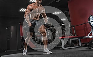 Closeup portrait of professional bodybuilder workout with barbel