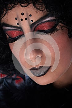 Closeup portrait of professional devil makeup