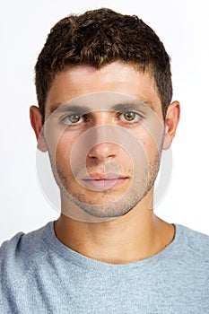 Closeup portrait of serious young man