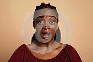 Closeup portrait of shocked african american woman