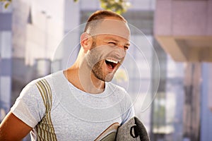 Closeup portrait of shouting man outdoors