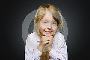 Closeup portrait shy girl isolated grey background