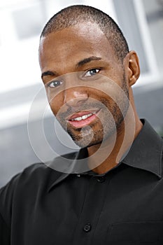 Closeup portrait of smiling black man