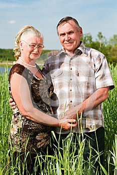 Closeup portrait of a smiling elderly couple