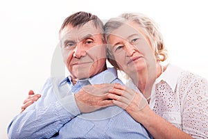 Closeup portrait of smiling elderly couple