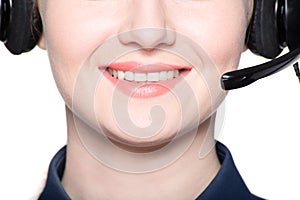 Closeup portrait of smiling support phone operator in headset