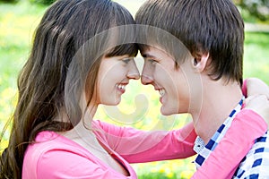 Closeup portrait of smiling young couple