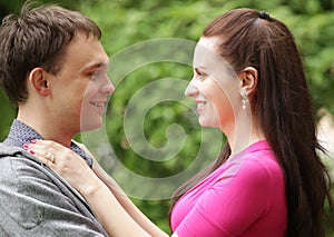 Closeup portrait of smiling young couple in love