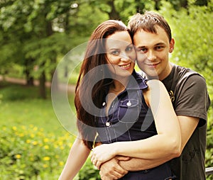 Closeup portrait of smiling young couple in love