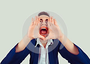 Closeup portrait stressed, frustrated shocked business woman yelling screaming up temper tantrum isolated light green white wall