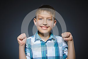 Closeup portrait successful happy boy isolated grey background.