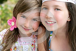 Closeup portrait of two little girl sisters