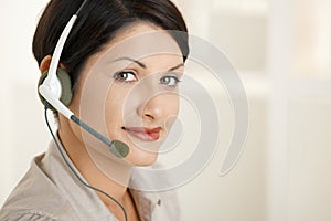 Closeup portrait of woman with headset