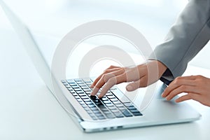 Closeup Portrait of Woman's Hand Typing on Computer Keyboard