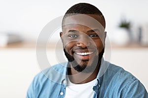 Closeup Portrait Of Young Cheerful Handsome African American Man Smiling At Camera