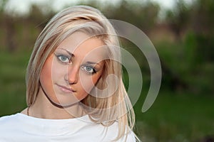 Closeup portrait of young lovely blonde