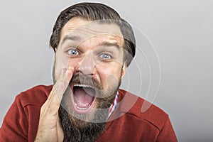 Closeup portrait of a young man shouting