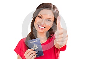 Closeup portrait of young positive woman holding passport