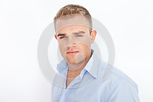 Closeup portrait of young serious businessman