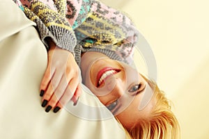 Closeup portrait of a young smiling woman