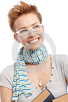 Closeup portrait of young woman in glasses