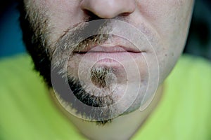 Closeup portraite man with half shaved face beard