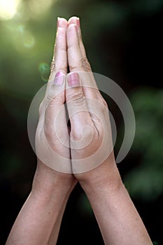 Closeup of praying hands