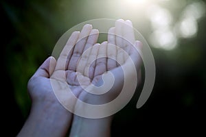 Closeup of praying hands