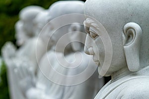 Closeup of praying statues, Linh Ung Pagoda, Da Nang, Vietnam