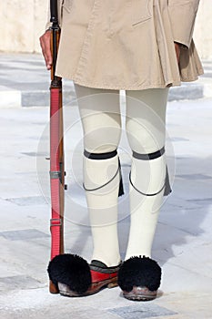 Closeup of presidential guard's legs with gun in Athens