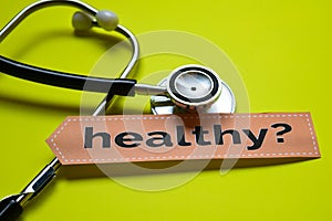 Closeup prevetion cure with stethoscope concept inspiration on yellow backgroundCloseup Healthy with stethoscope concept inspirati