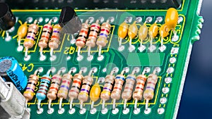 Closeup of printed circuit board with electronic components. Electrotechnics photo