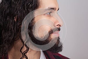 Closeup profile side view of handsome confident man with black l