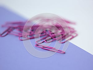 Closeup of purple paperclips