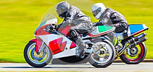 Closeup racing motorbikes photo