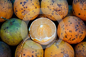Closeup of Rangpur limes in a market