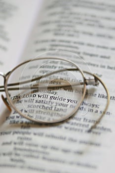 Closeup Reading Glasses On Open Bible