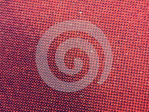 Closeup of a real vintage comic book page with a pattern of red dots from the printing process on paper background
