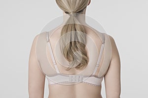 Closeup Rear View Of Young Woman In Bra